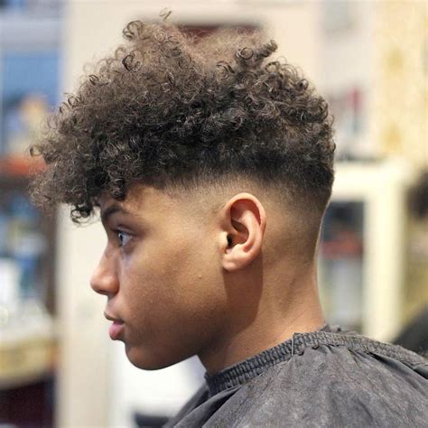 High fade with high top. Top 10 Men's Curly Hairstyles