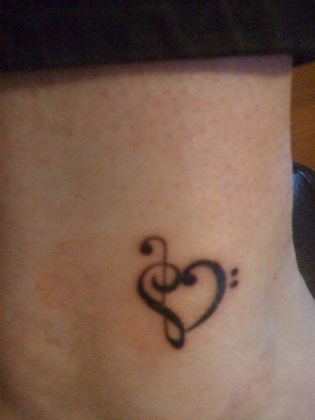 Pin By Mo Henry On Music Heart Tattoo Music Tattoos Music Notes