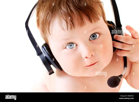 Portrait Of Baby With Headset On White Background Stock Photo Alamy