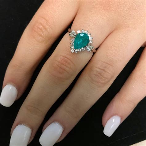 We are happy to help you customize the perfect diamond engagement ring for your special someone, a piece of jewelry to commemorate an anniversary or special occasion, or to reward yourself with incredibly affordable wholesale diamond rings and select jewelry of the highest quality. Pear Shape Emerald Engagement Ring For Sale at 1stdibs
