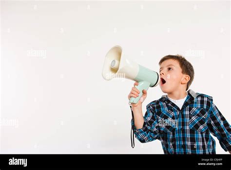 Boy Shouting Through Megaphone Stock Photo Alamy