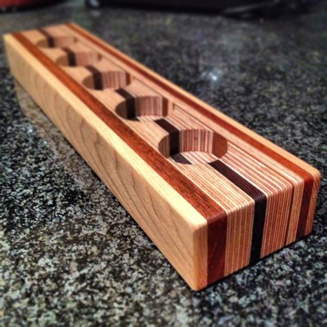 4.7 out of 5 stars. Candle Holder made form layers of plywood, mahogany, wenge ...