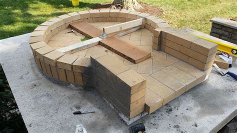 Centered on top of that, make a surface of firebrick, laid flat, roughly 10 bricks wide and 5 bricks deep. My outdoor brick oven build | Brick oven outdoor, Brick ...