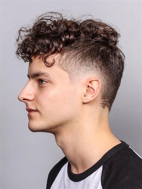 A brown curly shag with fringe is the focal point of the cut and eliminates the dreaded triangle shape that happens so often when curly hair lays heavy along the perimeter. 50 Modern Men's Hairstyles for Curly Hair (That Will ...