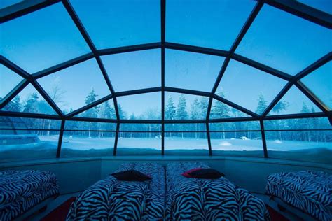 stay in this amazing glass igloo and watch the northern lights from bed kakslauttanen arctic