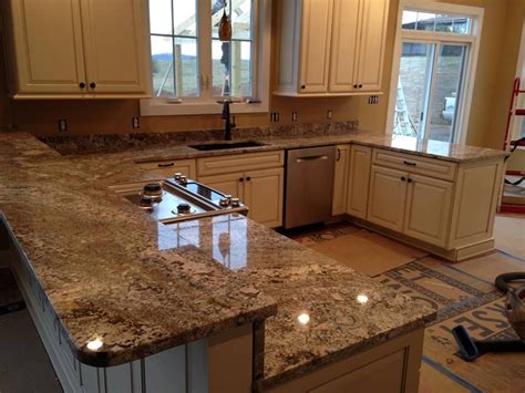 Crema bordeaux granite fireplace hearth. The Collins family chose a gorgeous Persian Treasure ...