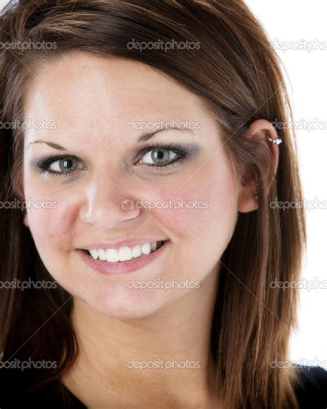 Closeup Headshot Of Smiling Young Woman — Stock Photo © Jbryson 21363849