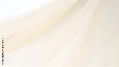 Silk Fabric Beige Pastel Color Forms Beautiful Folds In Air In Slow