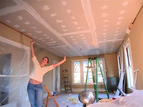 If necessary, trim around the edges of the hole to remove any obstructions that prevent a good fit. Dover Projects: How to Drywall a Ceiling