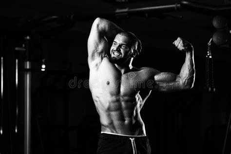 Bodybuilder Flexing Muscles Stock Image Image Of Exercising Beauty