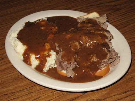 A pork dinner, the mashed potatoes, and the mushroom gravy all cooked at the same time, and in one pot seems to good to be true. Sill's Cafe | Roadfood