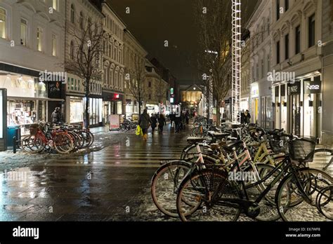 Walking Street With Melting Snow In The Center Of Aarhus Denmark In