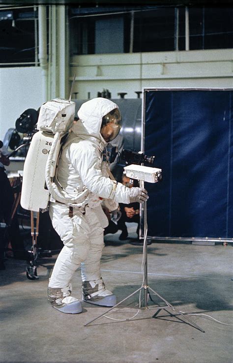 With more than half a billion people watching on television, he climbs down the ladder and proclaims: Apollo 11, Neil Armstrong Eva Training Photograph by ...