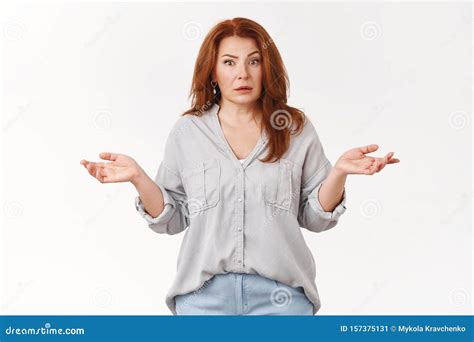 What Just Hapenned Confused Clueless Middle Aged Redhead Woman