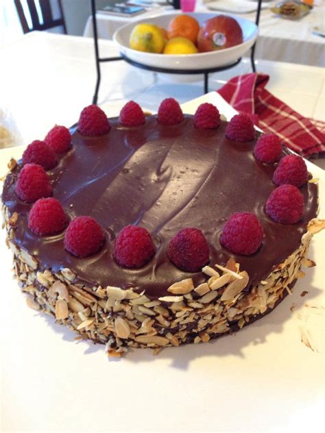 It has a chocolate cookie base, a simple chocolate mousse, a raspberry jelly on top, then fresh raspberries and a chocolate ganache are used to the cookie base is buttery and crunchy, the mousse is silky and rich, and the jelly and fresh raspberries cut through all the decadence. Chocolate Raspberry Torte | Raspberry torte, Sweet treats ...