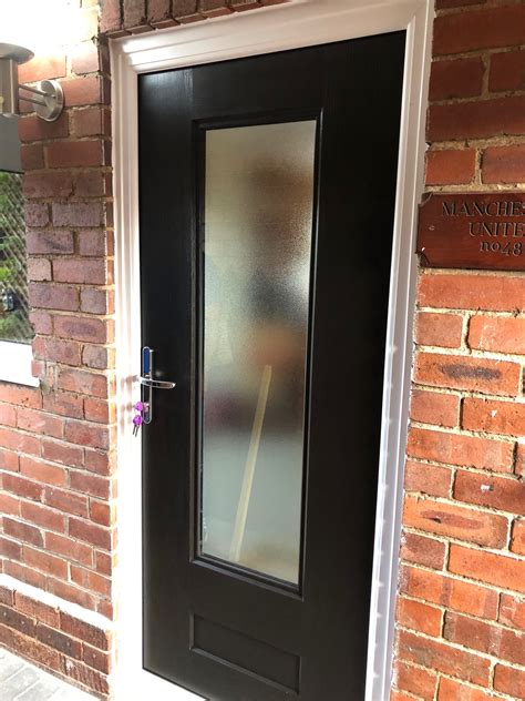 Rockdoor Vogue In Black With Sandstone Backing Glass Fitted In