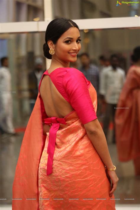 Saree Seduction Srinidhi Shetty In Orange Saree And Pink Backless Blouse