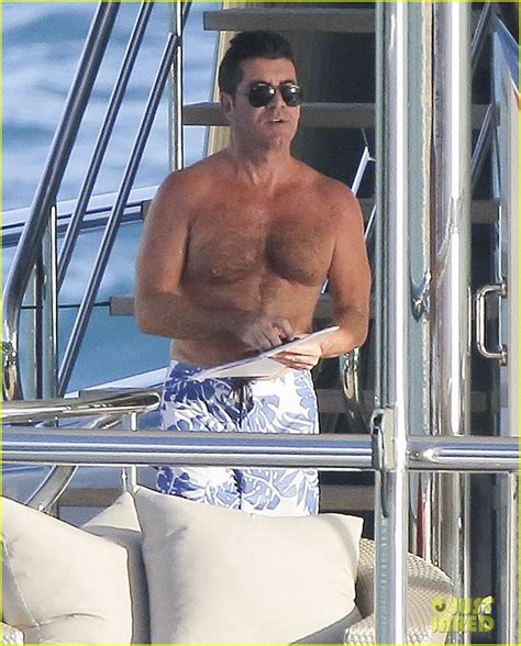 simon cowell and very pregnant girlfriend relax on a yacht photo 3023651 lauren silverman