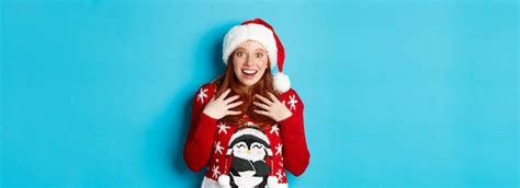 Free Photo Happy Holidays And Christmas Concept Surprised Redhead Girl Receiving Unexpected