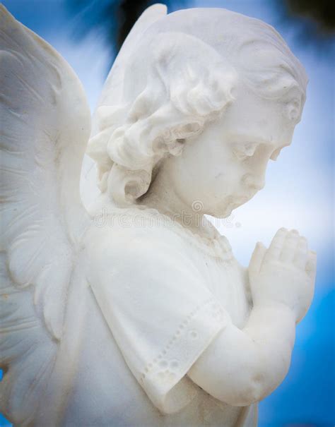 Child Angel Praying With A Sky Background Stock Photo Image Of Marble