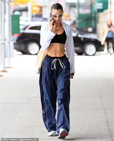 Bella Hadid Shows Off Her Toned Tummy In A Sports Bra While Heading To