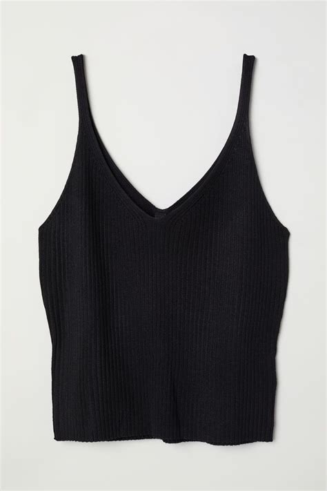 Two layers of gorgeous woven satin shapes this slinky tiered tank that has adjustable spaghetti straps, scoop neckline and a flowy bodice that ends at a slightly ruffled hem. Ribbed strappy top | Black | LADIES | H&M NZ | Affordable ...