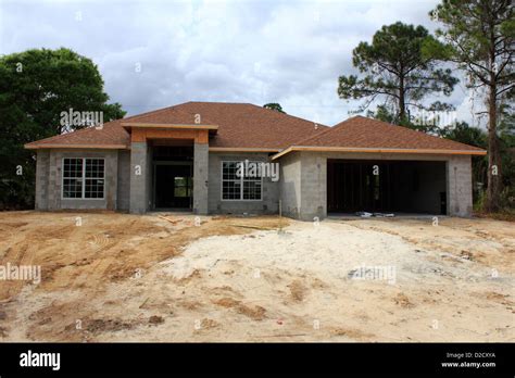 A typical 3 bedroom 2 bath cement block construction home house being