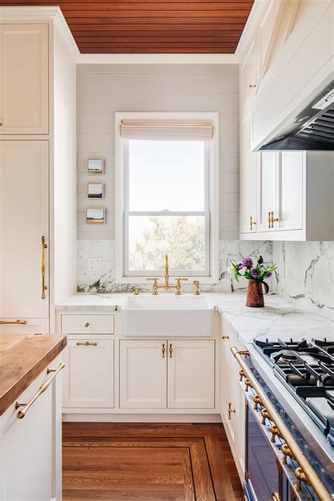 Check spelling or type a new query. An antique white porcelain farmhouse sink and solid brass ...