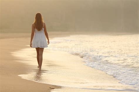 Woman Walking On The Sand Of The Beach Stock Image Image Of Back