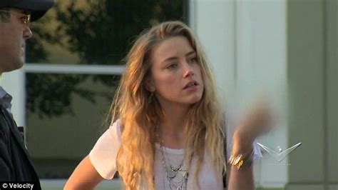 Amber Heard Flips Off Cops As She Gets Pranked By Johnny Depp Daily