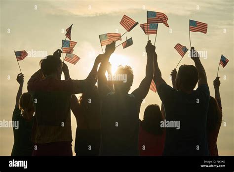 Group Of People Waving American Flags Stock Photo Alamy