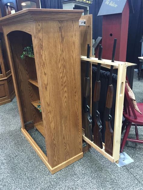 Hidden gun storage bookshelf gun cabinet by roughcountryrustic.bookcase/ storage in the front, guns and fishing gear in back? Pin on Furniture