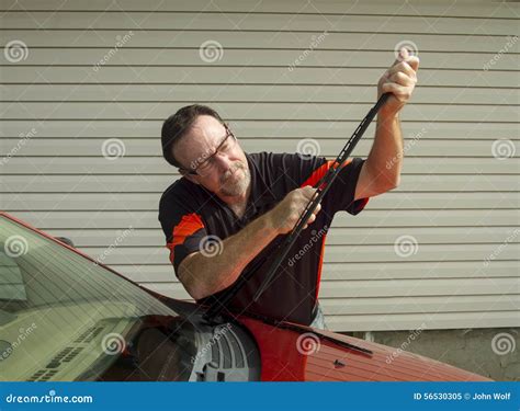 Mechanic Replacing Wiper Blades On A Car Stock Image Image Of