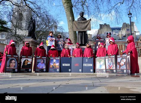 London, UK, 8th March, 2024. British-Iranians dressed in handmaids tale