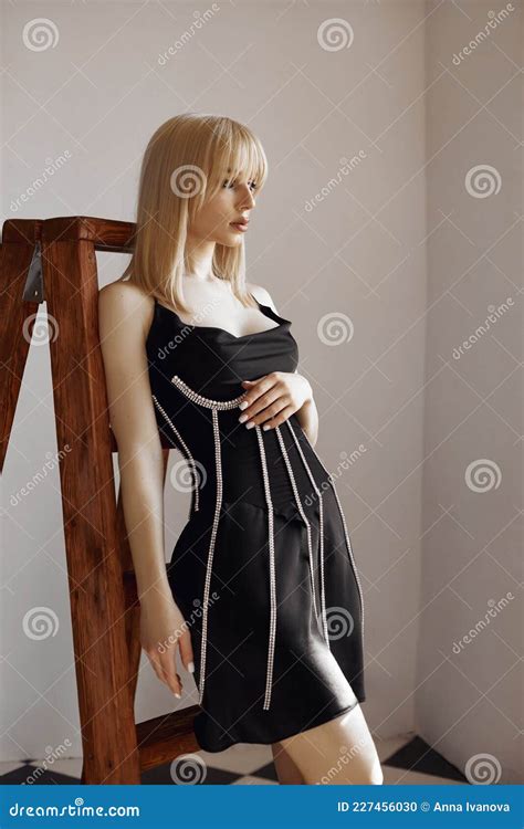 Retro Portrait Blonde Woman In Black Dress Vintage Interior Woman Posing At Window Sensual