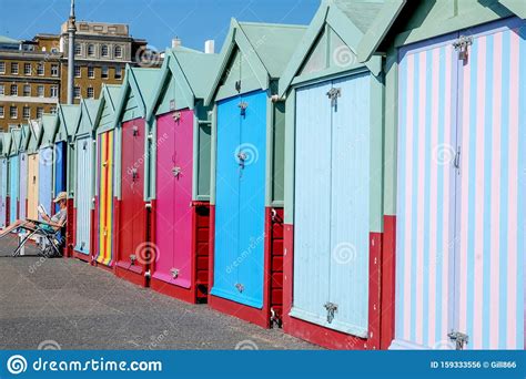 A Row Of 20 Colorful Beach Huts On Brighton Beach Editorial Photo