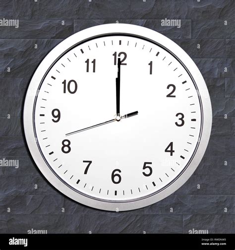 Wall Clock Set At Noon Or Twelve Oclock Stock Photo Alamy