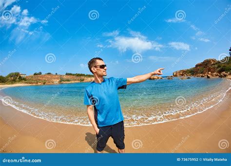 Man Standing In The Sea On The Beach Stock Photo Image Of