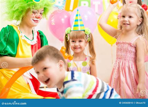 Kids Group And Clown On Birthday Party Stock Photo Image Of Group