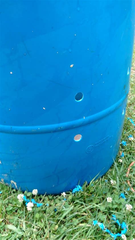 78 Holes Drilled In Plastic Barrel Approximately 8 Inches And 14