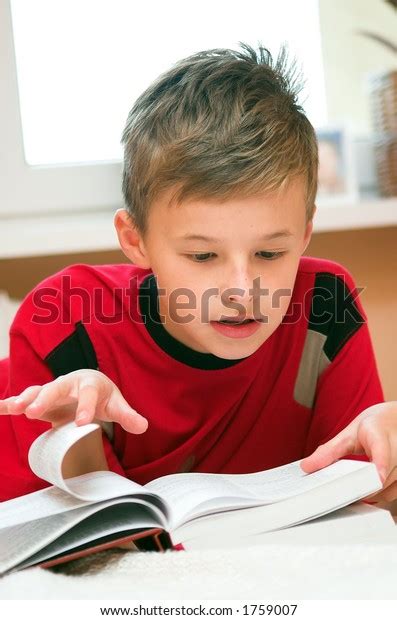 Young Boy Reading Book On Bed Stock Photo 1759007 Shutterstock