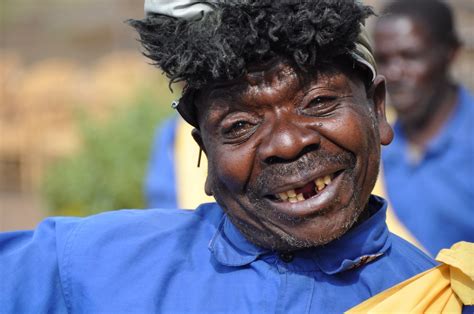 Maybe you would like to learn more about one of these? Happy black man without teeth free image