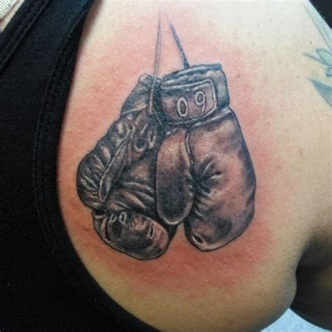 Charlinemurphy created a custom tattoo on 99designs. Boxing gloves black and gray tattoo
