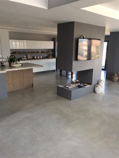 Make sure to smooth out any puddles of primer to end up with an even coat. - Coastal Crete Flooring | Decor | Piso cemento alisado ...