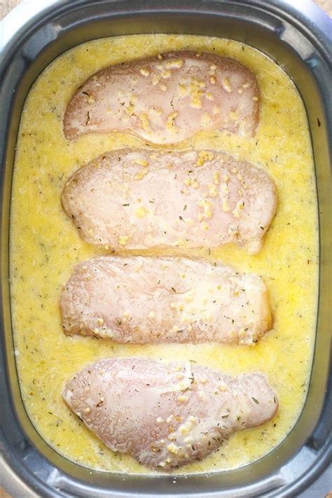 Crock Pot Creamy Lemon Butter Chicken Is Covered In A Creamy Sauce Made