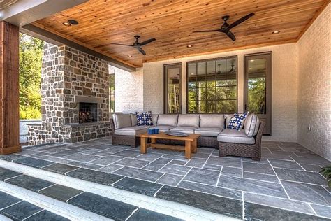 Back Porch With Cedar Tongue And Groove Ceiling And Slate Tile Patio