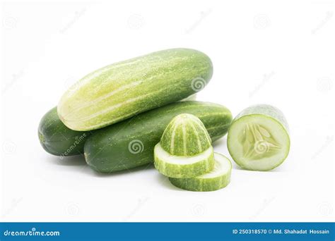 Whole Cucumber With Some Pieces Isolated On White Backgroundfresh
