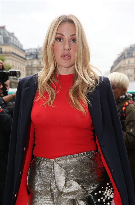 blond haired singer ellie goulding shows her amazing pokies in a red top gallery pic 1