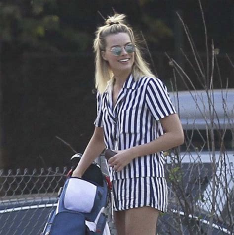 actress margot robbie swings the wrenches golfpunkhq