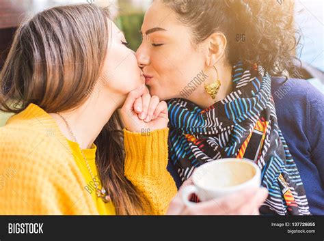 lesbian couple kissing image and photo free trial bigstock